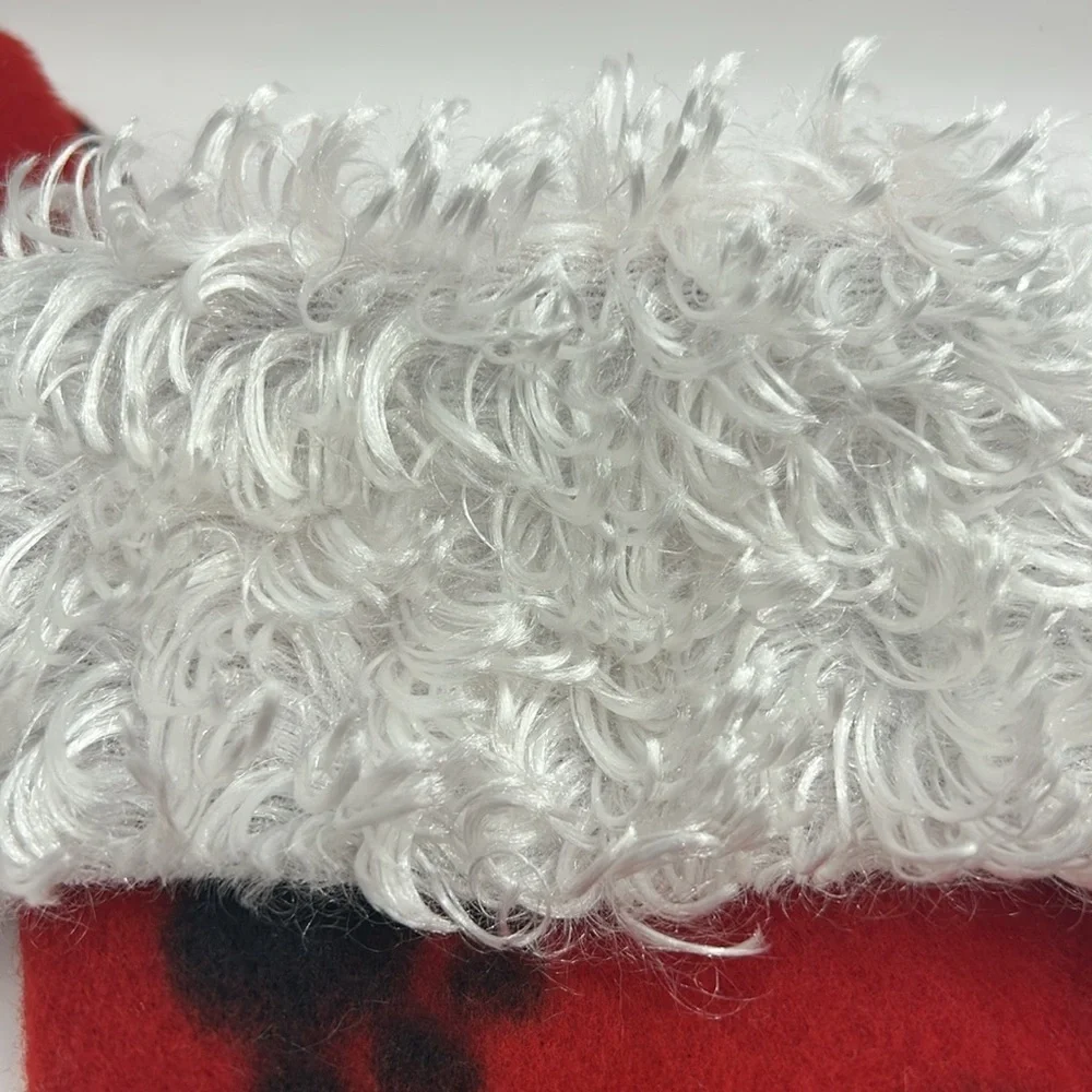 Red Christmas Stocking with Black Paw Prints.